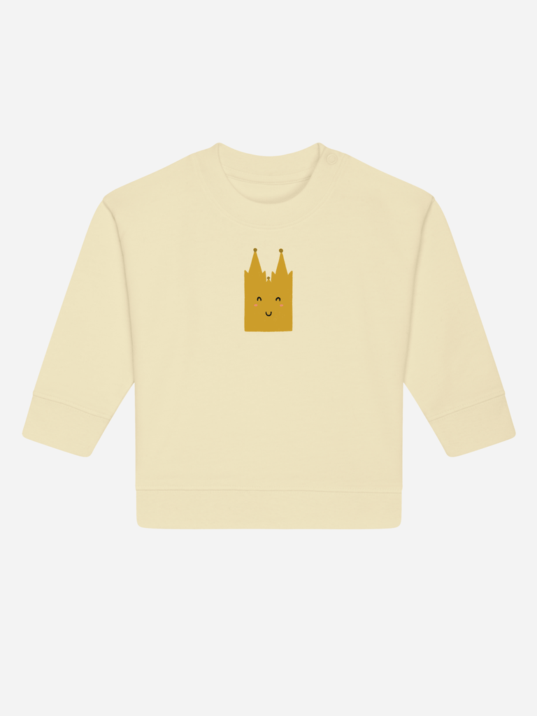 Beige Bio-Pullover für Kinder mit einem lächelnden Kölner Dom-Motiv, ideal als personalisierbares Babygeschenk.