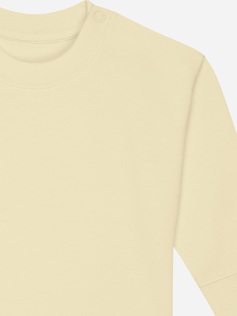 Personalisierbarer Bio-Pullover (0–3 J.) 'Schaukelpferd': Beliebtes Geschenk zu Weihnachten, cremefarbener Stoff.