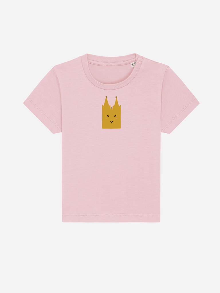 Personalisierbares pinkes Bio-T-Shirt für Kinder mit lächelndem Kölner Dom Motiv.