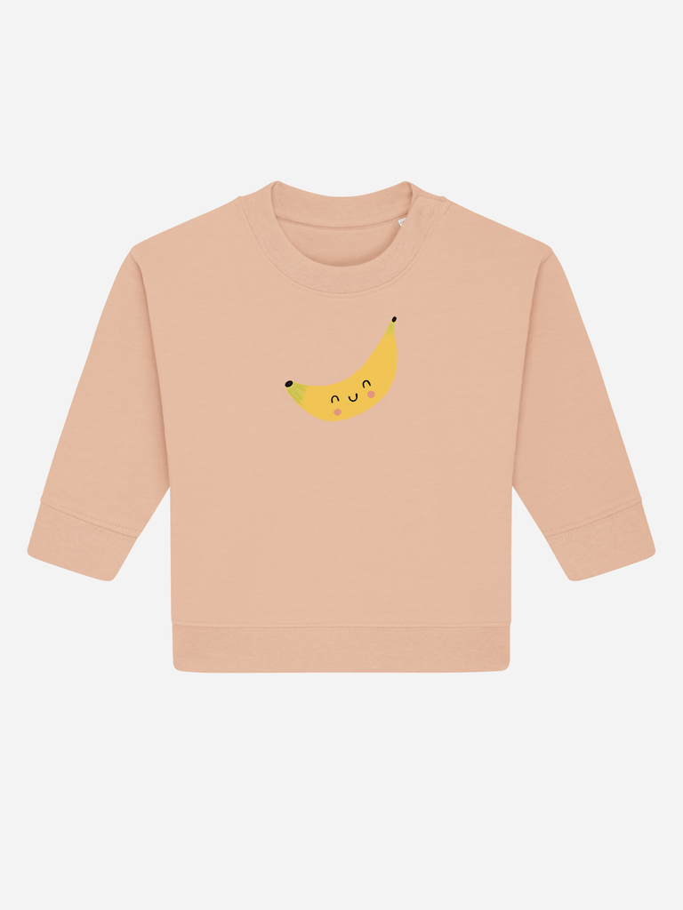 Personalisierbarer Bio-Pullover für Kinder (0–3 J.) mit fröhlichem Banane-Motiv in sanften Farben.